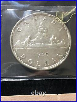 1945 Coin Mart Graded Canadian Silver Dollar EF-40